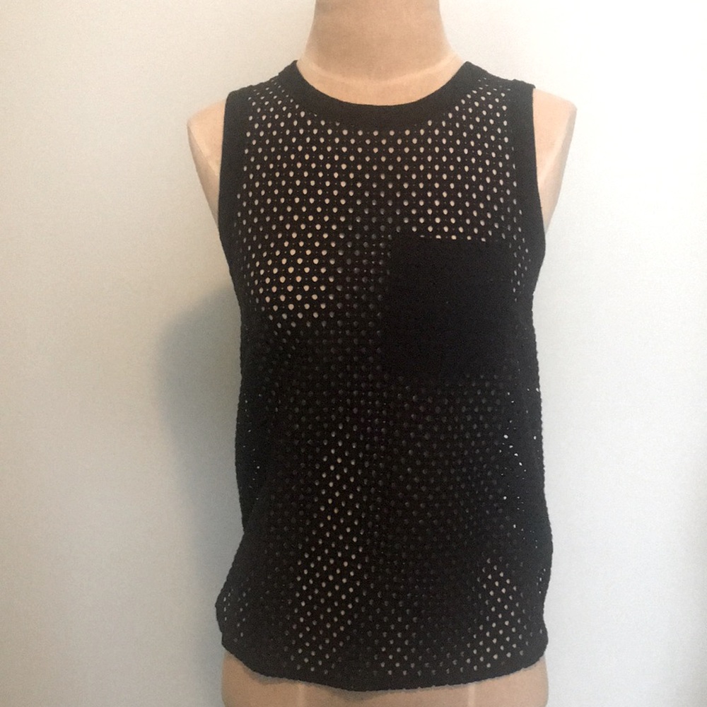 Black tank top with front pocket.